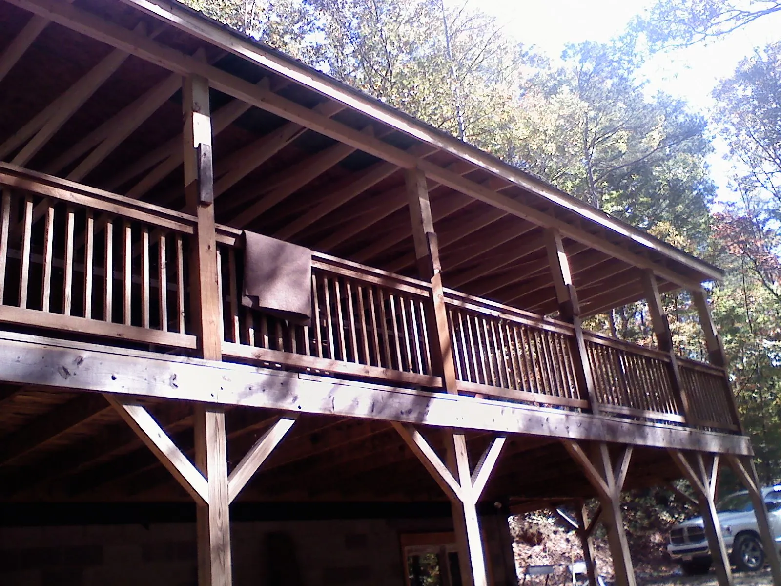 Timber framing under a new elevated porch and deck — Roof Leak Repair in Manti by Roofing Brothers